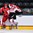 GRAND FORKS, NORTH DAKOTA - APRIL 15: Denmark's Victor Hansen #3 takes a hit from Canada's Michael McLeod #22 during preliminary round action at the 2016 IIHF Ice Hockey U18 World Championship. (Photo by Minas Panagiotakis/HHOF-IIHF Images)

